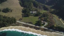 5K aerial stock footage pan from beach to reveal Carmel Monastery, Carmel, California Aerial Stock Footage | DFKSF16_040
