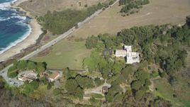 5K aerial stock footage of orbiting Carmel Monastery, revealing the nearby beach, Carmel, California Aerial Stock Footage | DFKSF16_041