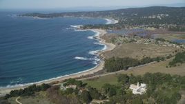 5K aerial stock footage of flying away from the beach and monastery by Carmel Bay, Carmel, California Aerial Stock Footage | DFKSF16_042