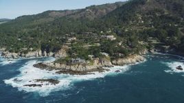 5K aerial stock footage of flying away from oceanfront mansions in Carmel, California Aerial Stock Footage | DFKSF16_049