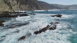 5K aerial stock footage fly low, tilt up to reveal rock formations and coastal cliffs, Big Sur, California Aerial Stock Footage | DFKSF16_078