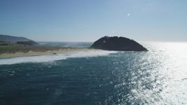 5K aerial stock footage of tilting up from ocean revealing Point Sur Light Station, Big Sur, California Aerial Stock Footage | DFKSF16_088