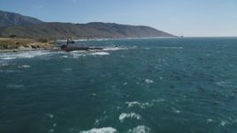 5K aerial stock footage tilt up from ocean to reveal coastline, Big Sur, California Aerial Stock Footage | DFKSF16_096
