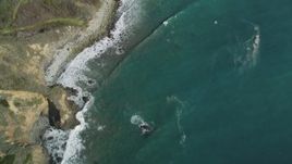 5K aerial stock footage of a bird's eye view of coastal cliffs, revealing rocky beach, Big Sur, California Aerial Stock Footage | DFKSF16_112