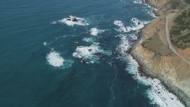 5K aerial stock footage of flying away from Highway 1 and coastal cliffs, Big Sur, California Aerial Stock Footage | DFKSF16_128
