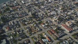 5K aerial stock footage of a reverse view of suburban neighborhoods in Morro Bay, California Aerial Stock Footage | DFKSF16_157