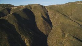 5K aerial stock footage of passing by mountain ridge, San Luis Obispo County, California Aerial Stock Footage | DFKSF17_018