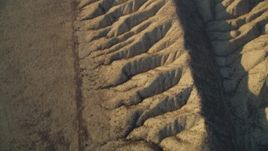 5K aerial stock footage tilt from bird's eye of the San Andreas Fault to wider view of desert in San Luis Obispo County, California Aerial Stock Footage | DFKSF17_028