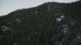 5K aerial stock footage fly over patches of snow and forest in the mountains, Los Padres National Forest, California, sunset Aerial Stock Footage | DFKSF17_050
