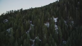 5K aerial stock footage of flying over patches of snow and mountain in the Los Padres National Forest, California, twilight Aerial Stock Footage | DFKSF17_051