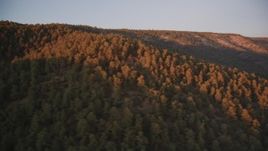 5K aerial stock footage of flying by wooded mountain ridge, Los Padres National Forest, California, sunset Aerial Stock Footage | DFKSF17_056