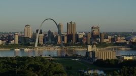 5.7K aerial stock footage of the skyline and Museum at the Gateway Arch along the Mississippi River, sunrise, Downtown St. Louis, Missouri Aerial Stock Footage | DX0001_000516