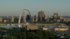 5.7K aerial stock footage of the skyline and Arch across from a park and grain elevator, Downtown St. Louis, Missouri Aerial Stock Footage | DX0001_000517