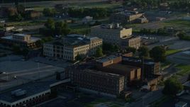 5.7K aerial stock footage orbiting a federal courthouse and medical center, sunrise, East St. Louis, Illinois Aerial Stock Footage | DX0001_000526