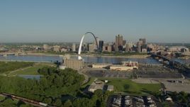 5.7K aerial stock footage of the Arch and skyline seen from across the Mississippi River, sunrise, Downtown St. Louis, Missouri Aerial Stock Footage | DX0001_000539
