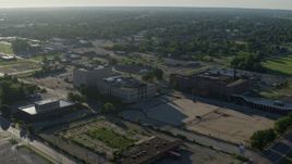 5.7K aerial stock footage wide angle of a federal courthouse and abandoned hospital, sunrise, East St Louis, Illinois Aerial Stock Footage | DX0001_000559