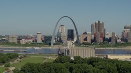 5.7K aerial stock footage of grain elevator and St. Louis Arch among city skyline, Downtown St. Louis, Missouri Aerial Stock Footage | DX0001_000571
