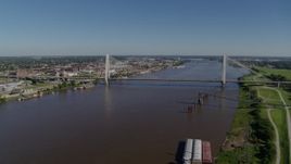 6K drone aerial of a cable-stayed bridge spanning a river, St. Louis, Missouri Aerial Stock Footage | DX0001_000587