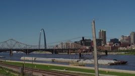 5.7K aerial stock footage of the Gateway Arch and bridge across the river, Downtown St. Louis, Missouri Aerial Stock Footage | DX0001_000617