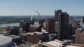 5.7K aerial stock footage of the Gateway Arch behind office buildings in Downtown St. Louis, Missouri Aerial Stock Footage | DX0001_000621