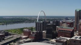 5.7K aerial stock footage flyby office buildings for a view of the Gateway Arch in Downtown St. Louis, Missouri Aerial Stock Footage | DX0001_000625
