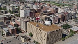 5.7K aerial stock footage reverse view of City Museum in Downtown St. Louis, Missouri Aerial Stock Footage | DX0001_000632