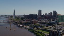 5.7K aerial stock footage of the Gateway Arch and office buildings in Downtown St. Louis, Missouri, seen from the river Aerial Stock Footage | DX0001_000644