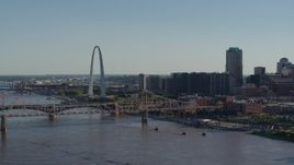 5.7K aerial stock footage of the famous Arch behind the bridge in Downtown St. Louis, Missouri Aerial Stock Footage | DX0001_000656