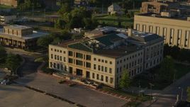 5.7K aerial stock footage of flying around a federal courthouse at sunset in East St. Louis, Illinois Aerial Stock Footage | DX0001_000691