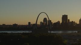 5.7K aerial stock footage of a view across the river at Gateway Arch and Downtown St. Louis, Missouri at sunset Aerial Stock Footage | DX0001_000699