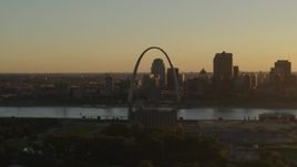 5.7K aerial stock footage of the Gateway Arch at sunset, across the river in Downtown St. Louis, Missouri Aerial Stock Footage | DX0001_000705