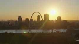5.7K aerial stock footage of the Downtown St. Louis, Missouri skyline seen while descending at sunset Aerial Stock Footage | DX0001_000710