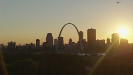 5.7K aerial stock footage of the Gateway Arch and Downtown St. Louis, Missouri skyline at sunset while descending Aerial Stock Footage | DX0001_000711