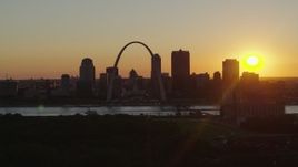 5.7K aerial stock footage flyby the Gateway Arch and skyline of Downtown St. Louis, Missouri at sunset Aerial Stock Footage | DX0001_000716