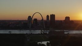 5.7K aerial stock footage of Downtown St. Louis, Missouri and the Gateway Arch across the river at sunset Aerial Stock Footage | DX0001_000717