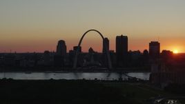 5.7K aerial stock footage setting sun behind Downtown St. Louis, Missouri and the Gateway Arch Aerial Stock Footage | DX0001_000735