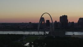 5.7K aerial stock footage of looking across the river at the Gateway Arch and Downtown St. Louis, Missouri, sunset Aerial Stock Footage | DX0001_000737