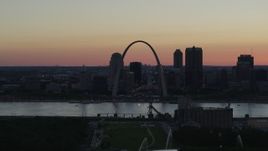 5.7K aerial stock footage Gateway Arch seen from grain elevator across the river, and fountains, Downtown St. Louis, Missouri, twilight Aerial Stock Footage | DX0001_000740