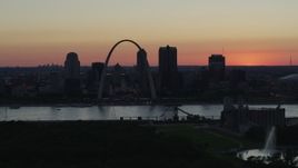 5.7K aerial stock footage of the Gateway Arch in Downtown St. Louis, Missouri at twilight, and the Gateway Geyser fountain Aerial Stock Footage | DX0001_000744