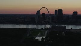 5.7K aerial stock footage of a stationary and flyby view of the Gateway Arch in Downtown St. Louis, Missouri, twilight Aerial Stock Footage | DX0001_000746