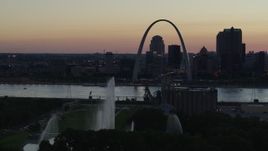 5.7K aerial stock footage water from Gateway Geyser and the Gateway Arch, Downtown St. Louis, Missouri, twilight Aerial Stock Footage | DX0001_000750