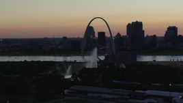 5.7K aerial stock footage of the Gateway Geyser and Arch while descending, Downtown St. Louis, Missouri, twilight Aerial Stock Footage | DX0001_000753