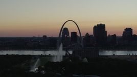 5.7K aerial stock footage ascend to approach Gateway Geyser, and the Arch in Downtown St. Louis, Missouri, twilight Aerial Stock Footage | DX0001_000754