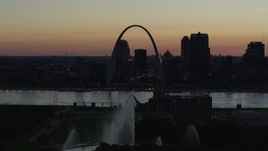 5.7K aerial stock footage approach Gateway Geyser and the Arch across the river, Downtown St. Louis, Missouri, twilight Aerial Stock Footage | DX0001_000761