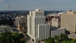 5.7K aerial stock footage reverse view of the Park Pacific high-rise in Downtown St. Louis, Missouri Aerial Stock Footage | DX0001_000788