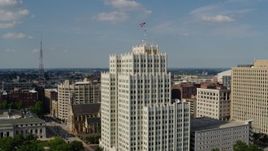 5.7K aerial stock footage of a view of the Park Pacific high-rise while descending in Downtown St. Louis, Missouri Aerial Stock Footage | DX0001_000791