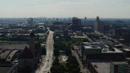 5.7K aerial stock footage of following Market Street near St. Louis Union Station Hotel, Downtown St. Louis, Missouri Aerial Stock Footage | DX0001_000796