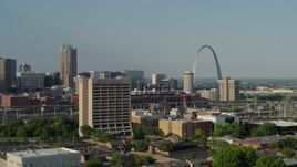 5.7K aerial stock footage fly away from office building and by stadium near Gateway Arch in Downtown St. Louis, Missouri Aerial Stock Footage | DX0001_000817