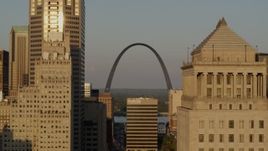 5.7K aerial stock footage flyby courthouse to reveal Gateway Arch at sunset, Downtown St. Louis, Missouri Aerial Stock Footage | DX0001_000838