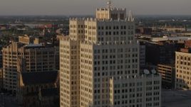 5.7K aerial stock footage of approaching an apartment building at sunset, Downtown St. Louis, Missouri Aerial Stock Footage | DX0001_000842